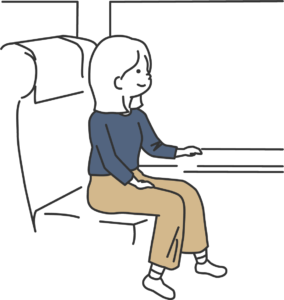 新幹線に座る女性
